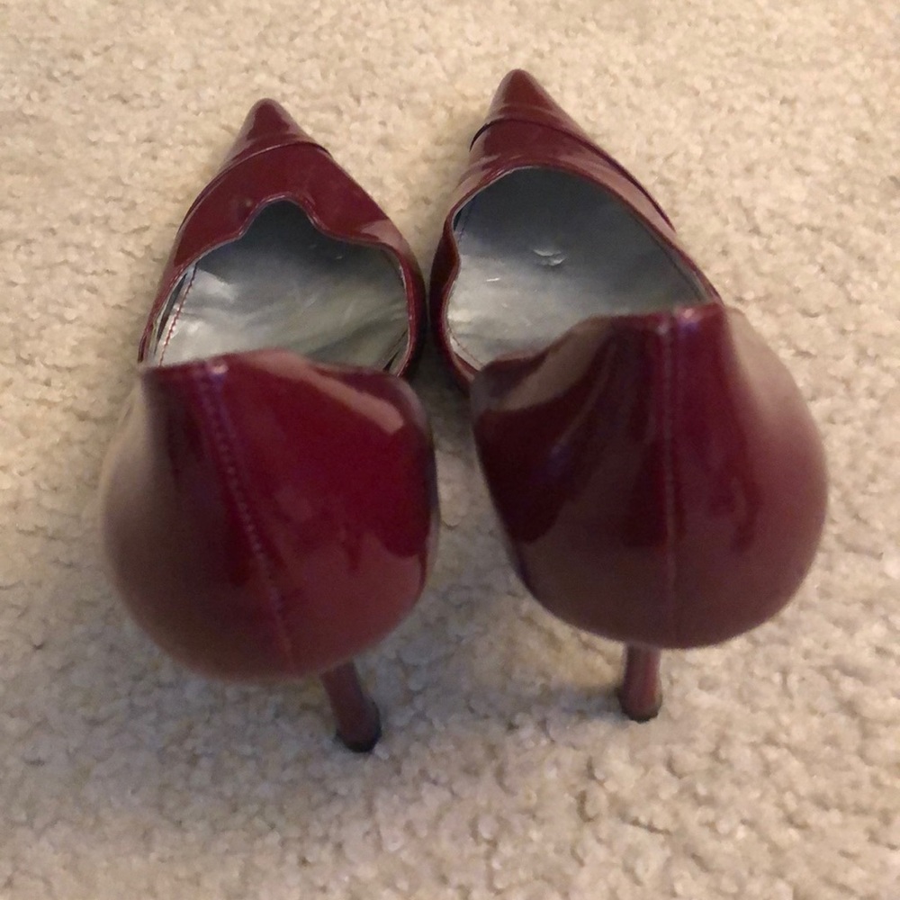 Red patent leather pumps